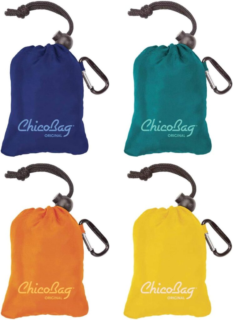 compact reusable grocery bag packs into itself small purse